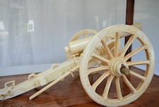 Cannon In Glass Case