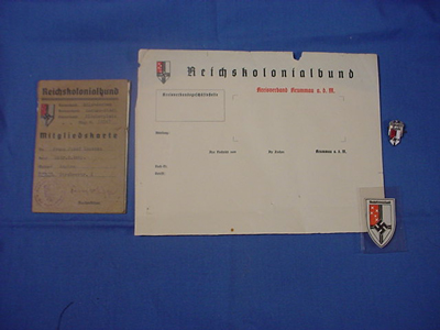 Member Booklet and Pin